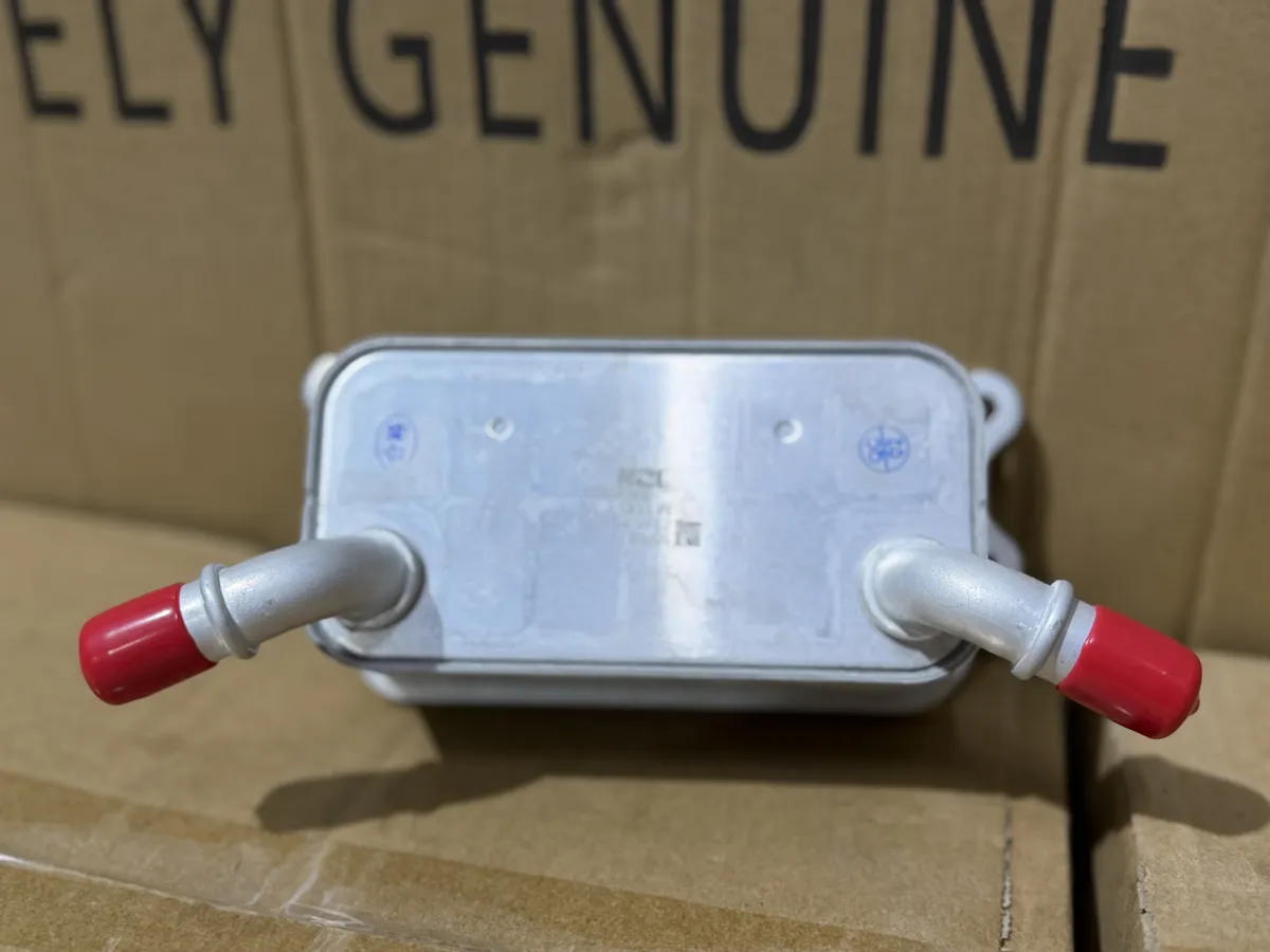 Радиатор масляный Geely Coolray