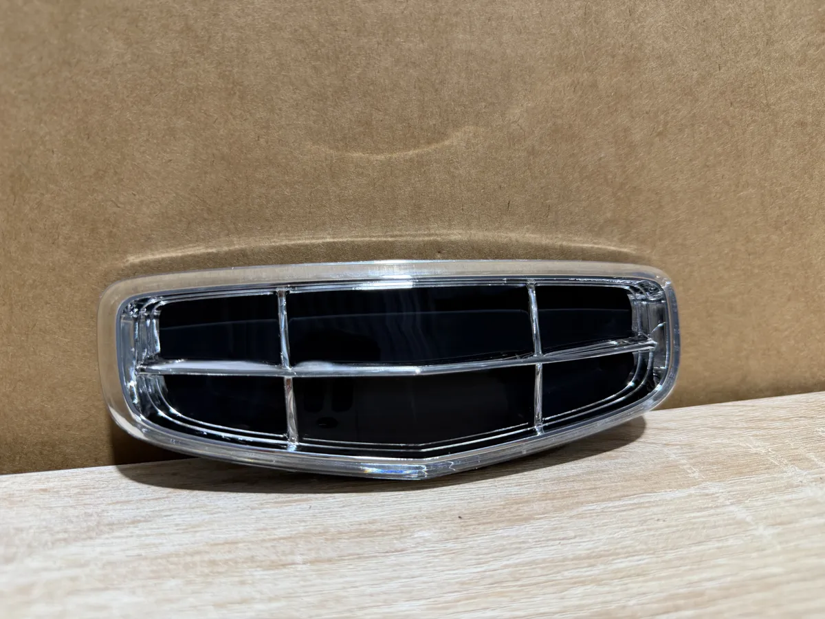 Эмблема решетки радиатора Geely Coolray
